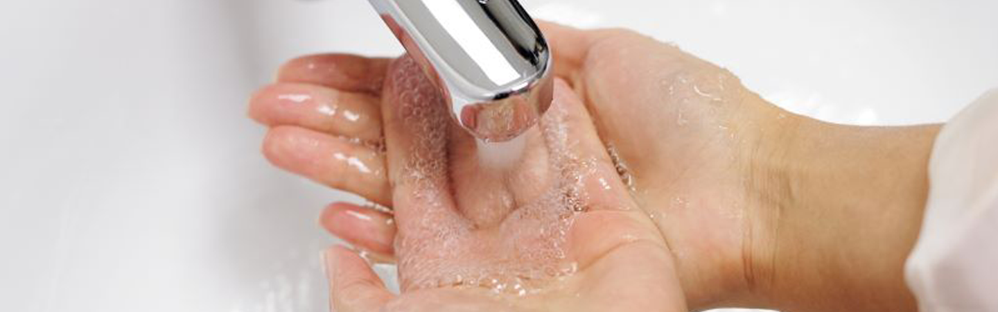 woman washing hands