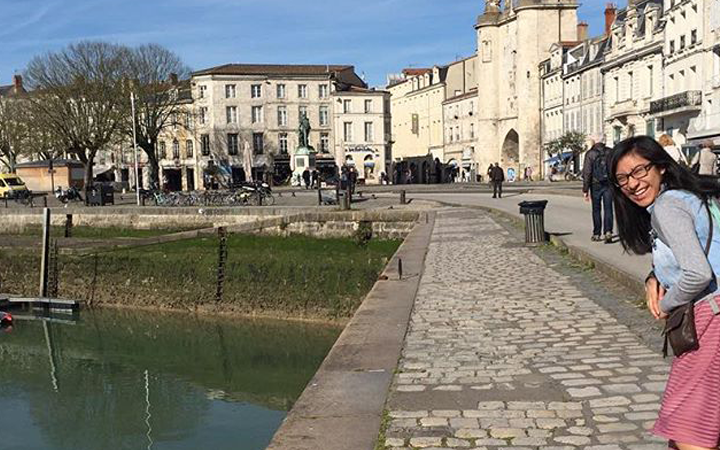 Girl walking along the Seine