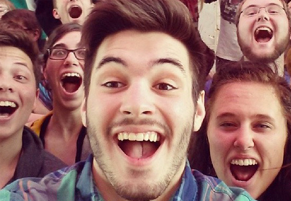 Happy guy taking selfie